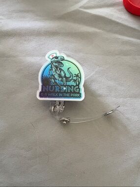 Nursing Badge Reel - 'Nursing is a Walk in the Park' Dino Design - Teal & Blue
